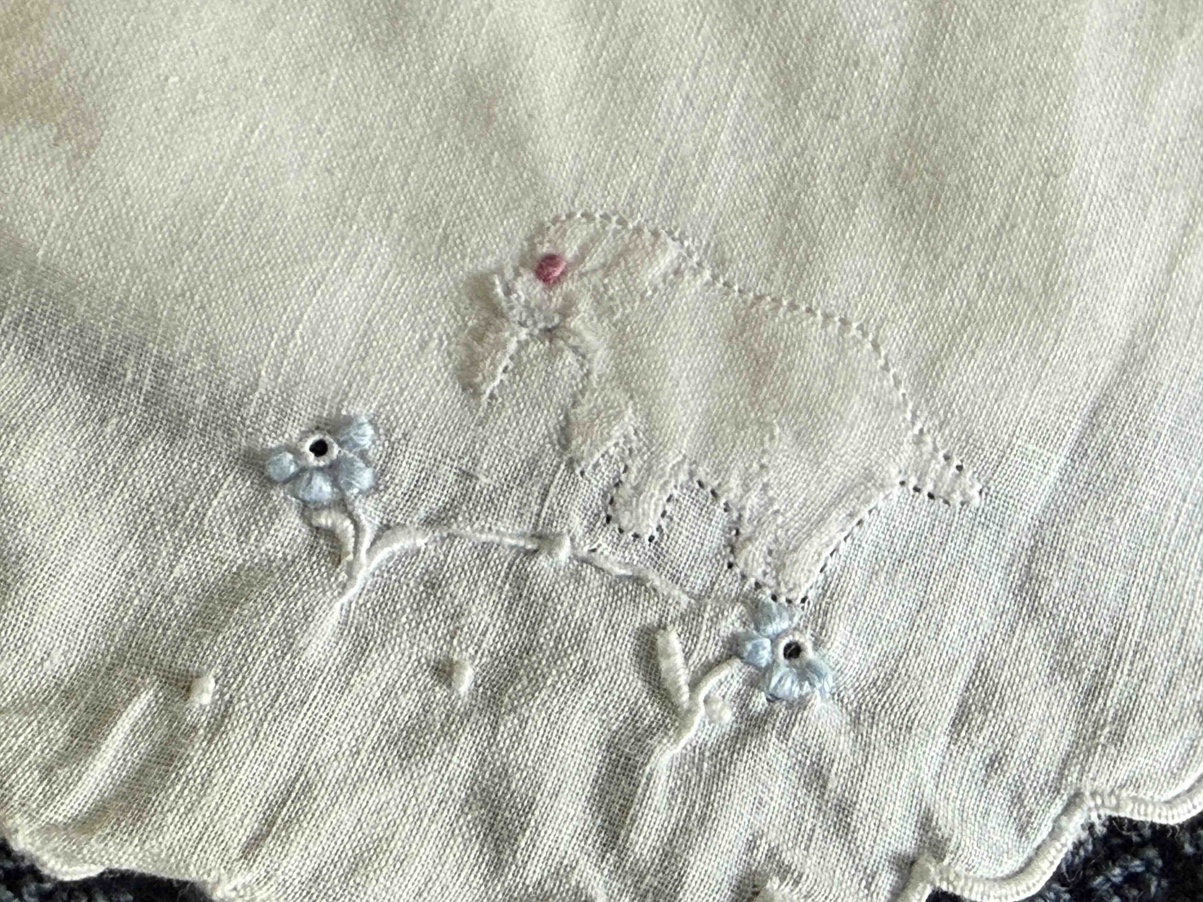 Vintage baby bib. Before the era of fast fashion, we expressed our love for our children, ourselves and others, through the effort we put into decorating even the most humble of utilitarian cloths.